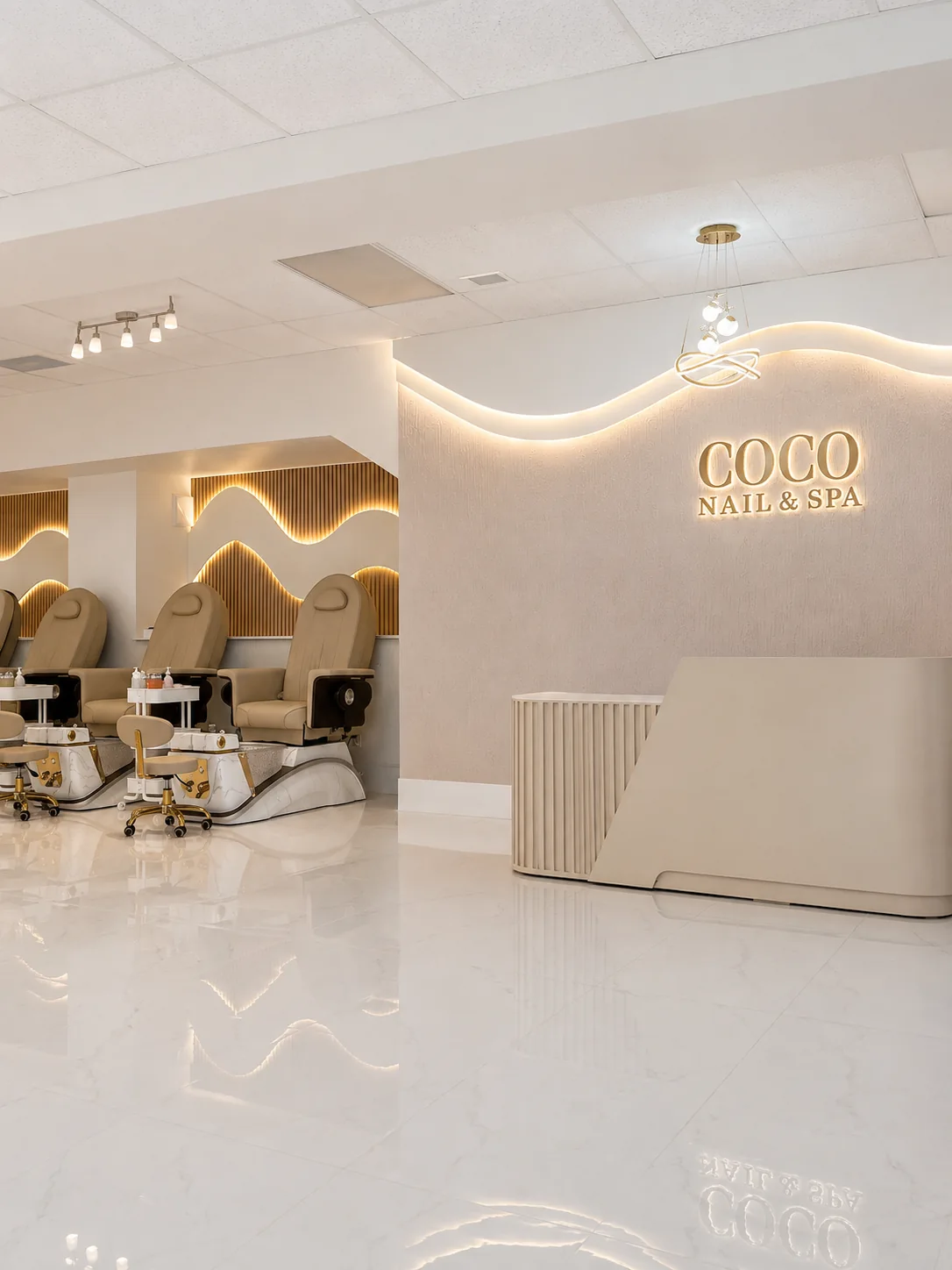 Coco Nails Spa interior — Soft curves & warm gold